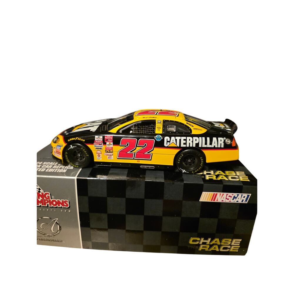 Ward Burton #22 Caterpillar 2002 Dodge Intrepid 1:24 Racing Champions Diecast